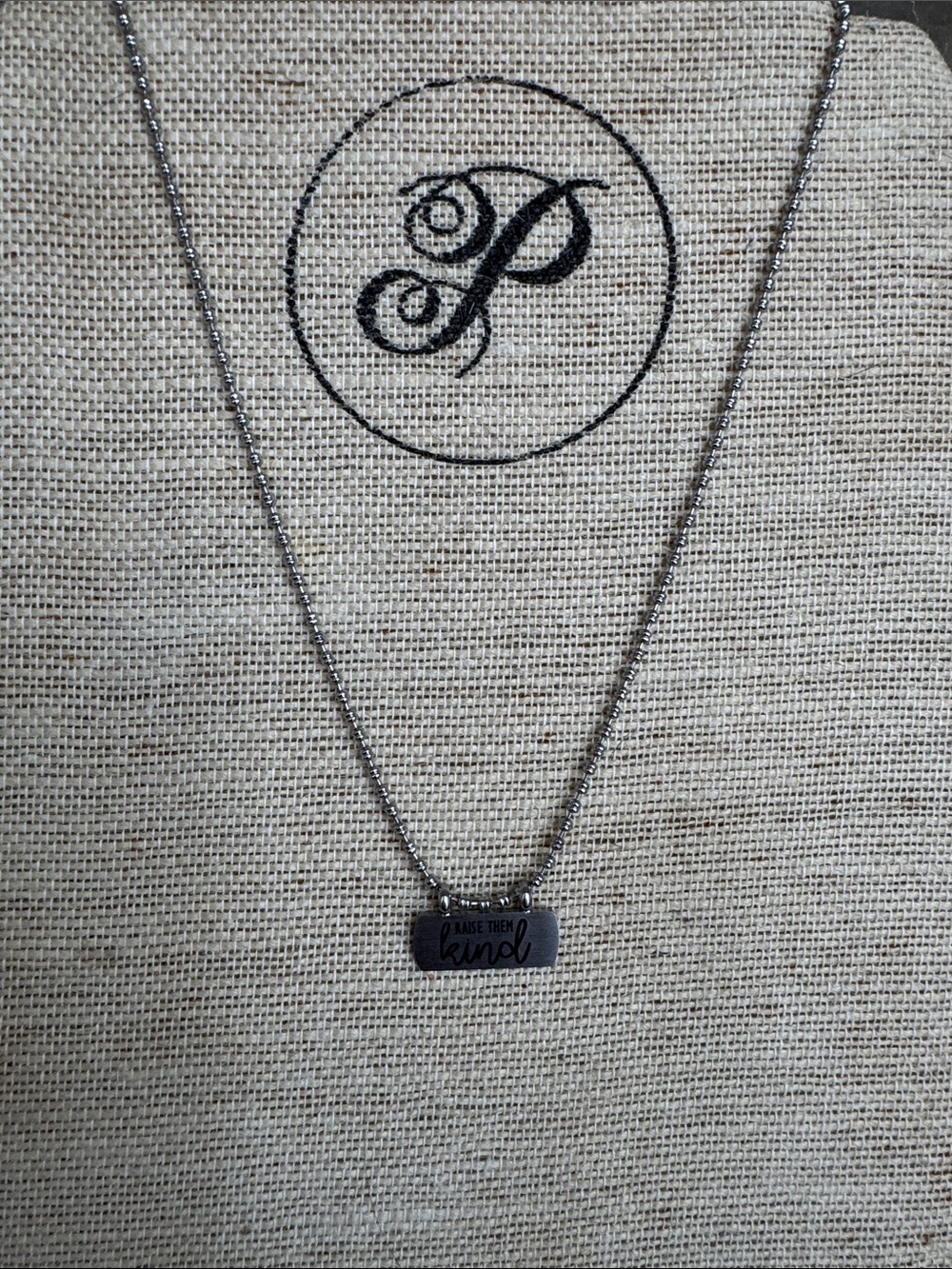 bloom Daphne Stainless Steel Engraved 'Raise them Kind' Bar Necklace jewelry